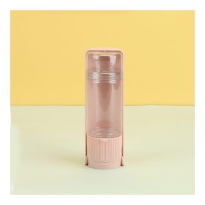 Portable dog water bottle shown in pink