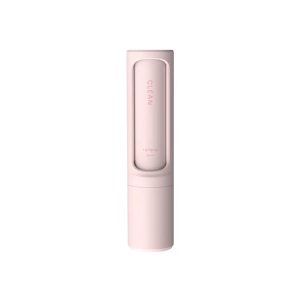Reusable pet hair remover brush on a white background