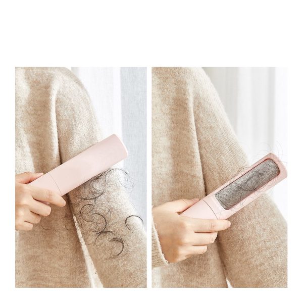 Reusable Pet Hair Remover Brush - Indoor scene Reusable pet hair remover brush used to lift fur from fabric